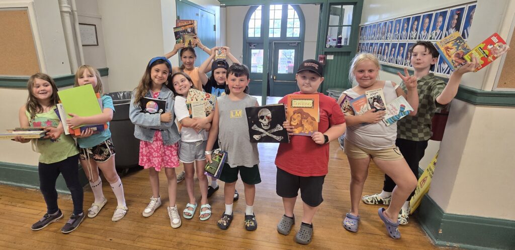 Grade 3/4 Students with books